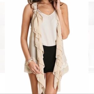 umgee off white frilly vest